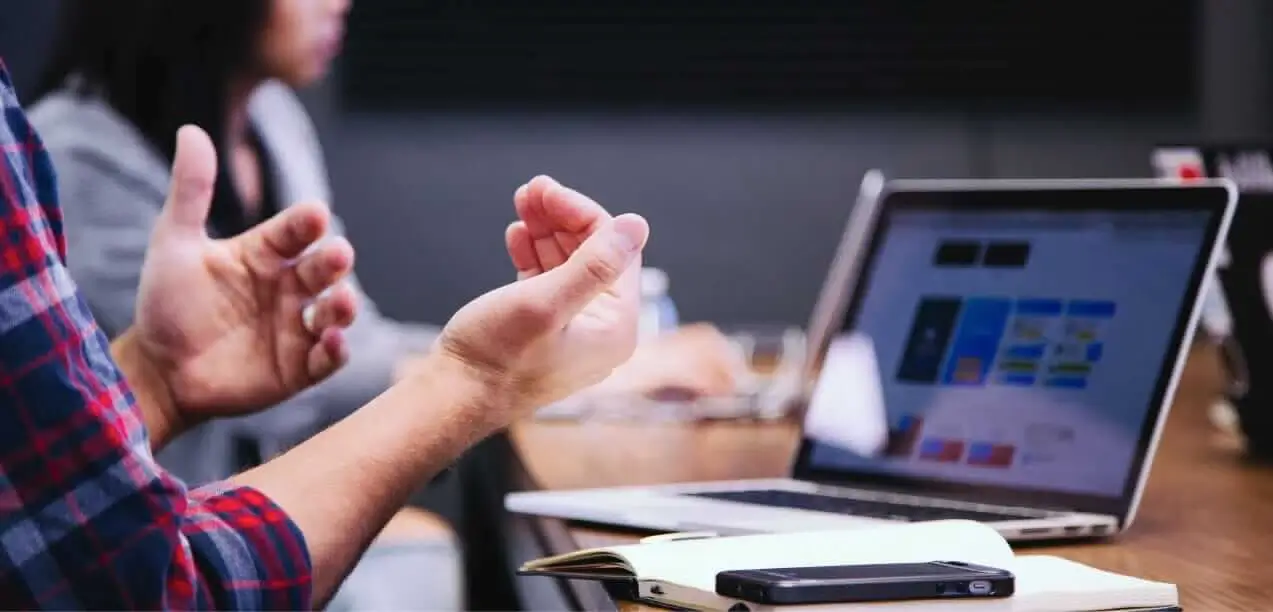 A man's hands and a laptop